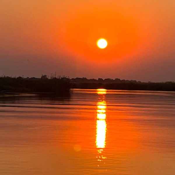 Sonnenuntergang am Chobe Fluss